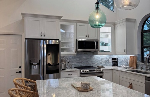 Hobe Sound House | Zephyr House in Zeus Park - Walk to Beach & Dining, Game Room, Screen Patio Boho