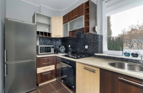 Grunwald Apartment | Zmigrodzka Stylish Apartment with Terrace by Noclegi Renters