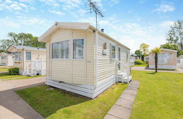 12ft-wide caravan with one double and one twin.