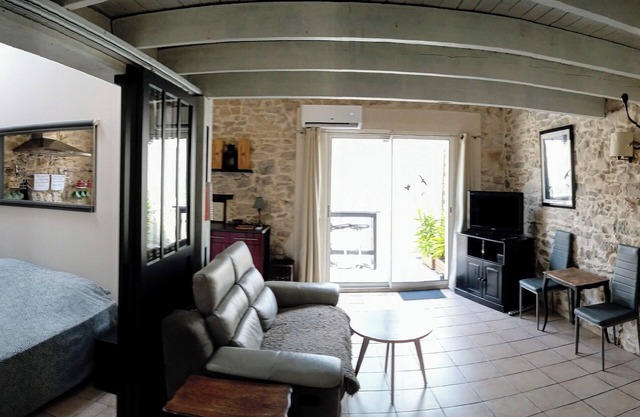 18th century stone village house with terrace, 15 minutes from beaches.