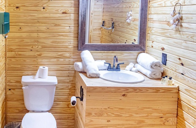 1bd rm, 1 bth, hotel style cabin w/Mini fridge, micro, & tv, at Kick Back Ranch