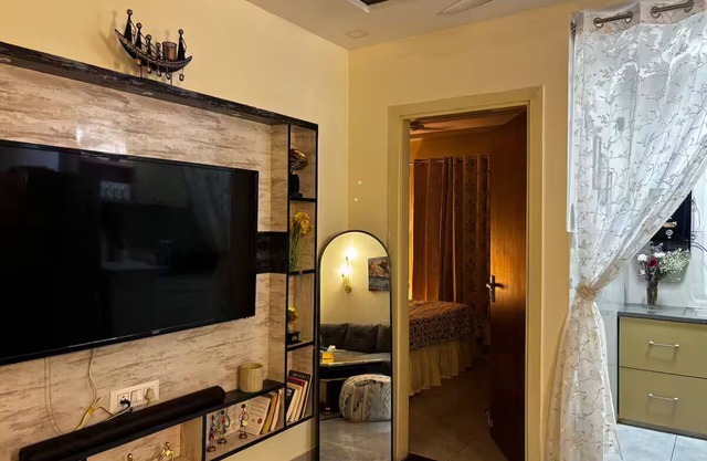 2bhk apartment with a cute kitchen and exclusive access to a private terrace. <3