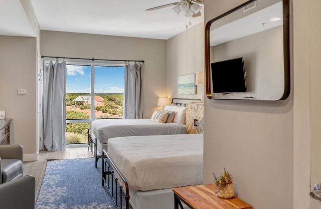 2BR Luau Suite on 7th Floor with spanning views of the lagoon pool and Gulf of Mexico at Sandestin Golf & Beach Resort
