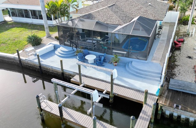 3 Bed 2 Bath on Deep Canal 5 minutes to channel CLEAN & NICE. New boat hoist