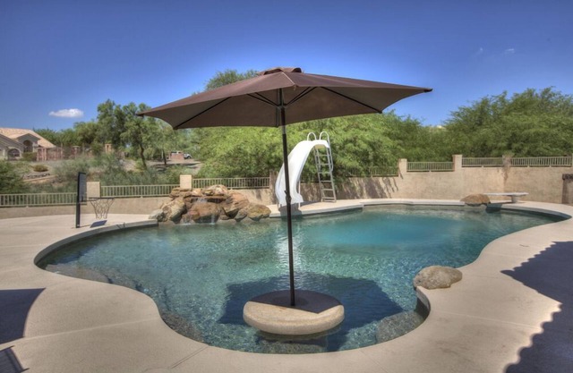 4 Bedroom Single Story Golf Course Home, Heated Diving Pool + Slide, & Hot Tub