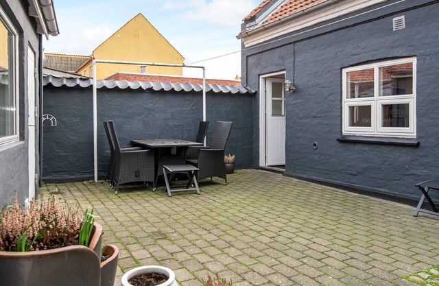 4 person holiday home in Grenaa