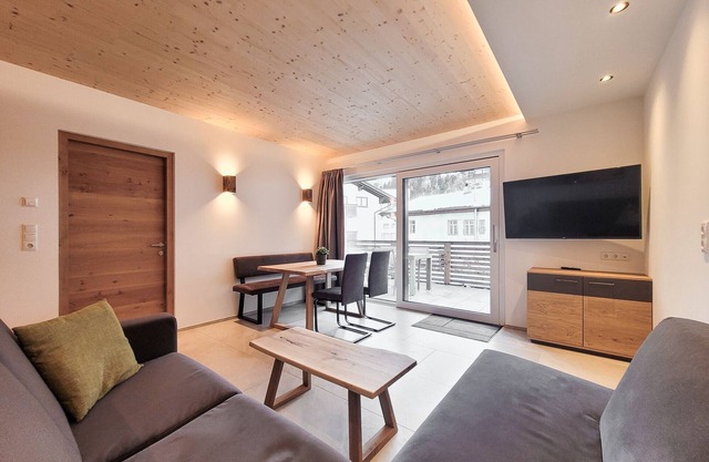 50m² modern holiday apartment with balcony, free swimming lake, 100 m from the ski area