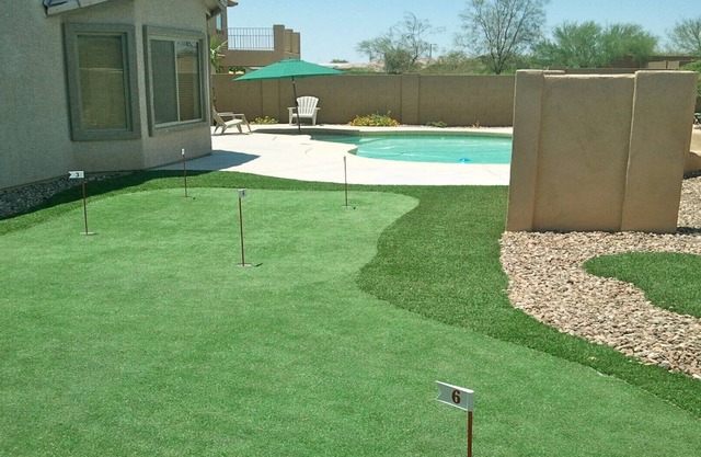 800 SQ FT PUTTING/CHIPPING GREEN NEXT TO HEATED POOL 4 BD RM HOME