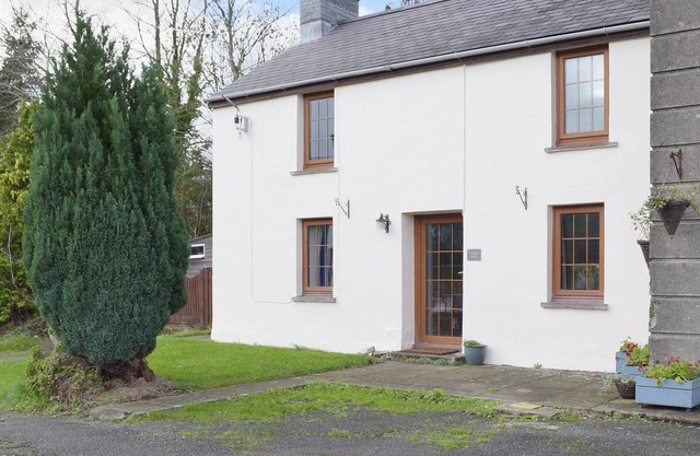 A beamed, character cottage situated just 100 yards from the River Teifi.