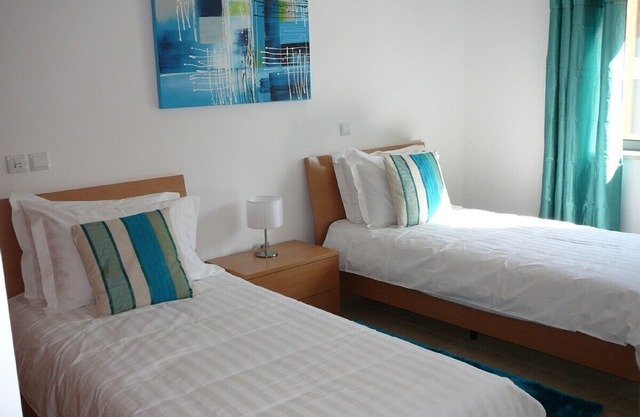 A luxurious 2 bedroom apartment centrally located with communal pools and gym.