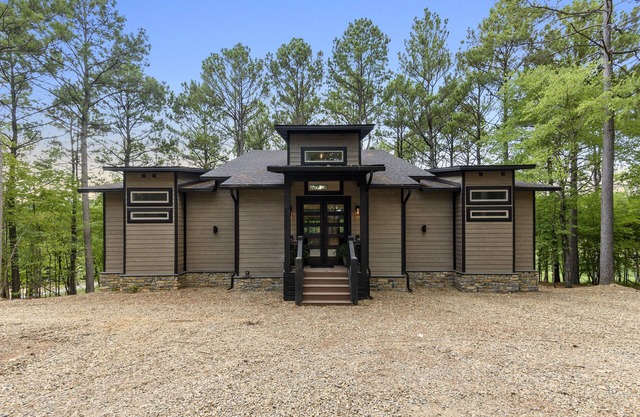 A new, cozy, modern rustic cabin on the water – close to all of the Pine Lake amenities.