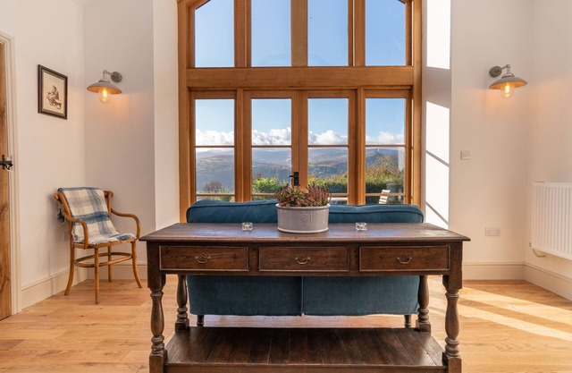 A recently converted barn that sits high above the beautiful Conwy Valley.