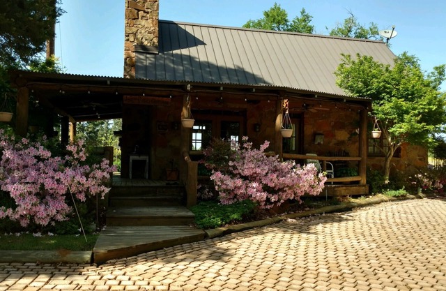 A rustic stone cottage on an estate close to the Texas State Railroad.
