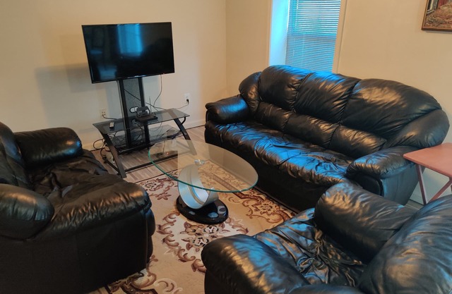 A spacious furnished 1bdr basement apartment.