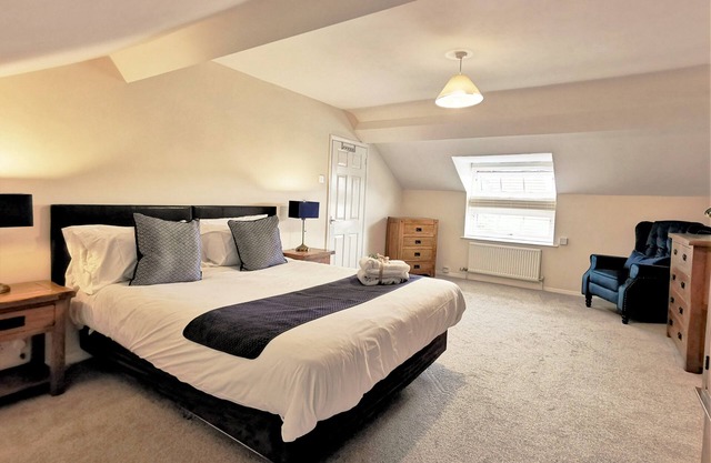 A thee bedroom, one bathroom that sleeps 5 guests in 3 bedrooms