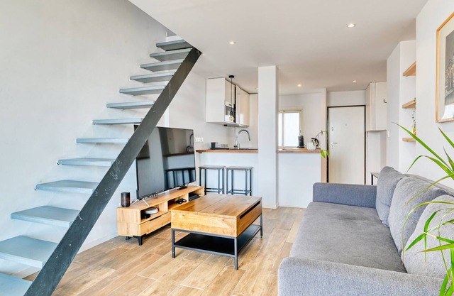 An elegant apartment with a breathtaking view of the surrounding area