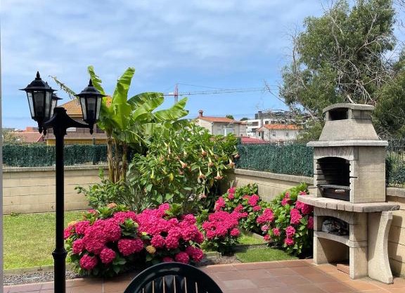 apartamento con jardín privado y barbacoa a 5 min playas santander