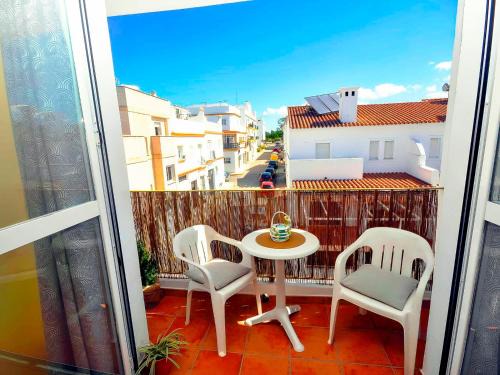 Apartamento céntrico con terraza y aire acondicionado solo familia y pareja