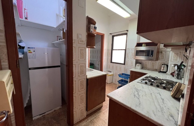 Apartment África T2 in comercial area