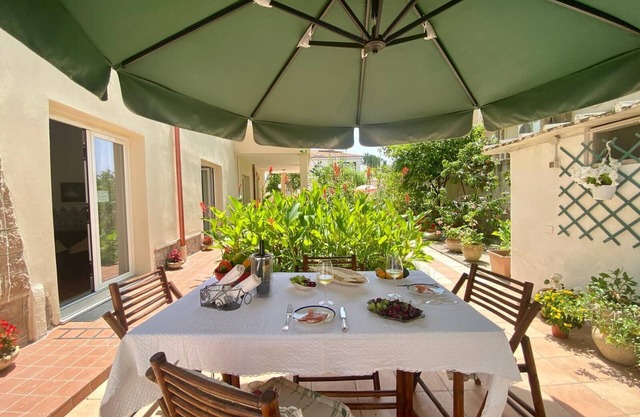 Apartment for 4 people facing the beach with garden