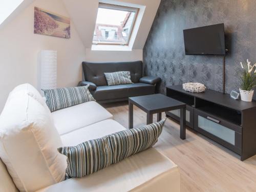 Apartment Vosseslag II duplex sunny appartment by Interhome