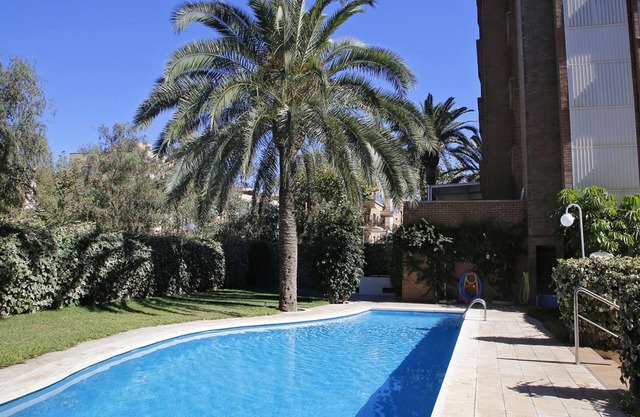AT011 LES PALMERES: Apartment for 5 people with pool on the beach front