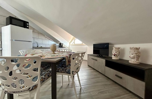 Attic room is unique and cozy in the center of the village.