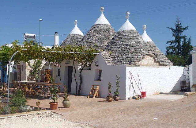 Authentic trullo in a vineyard