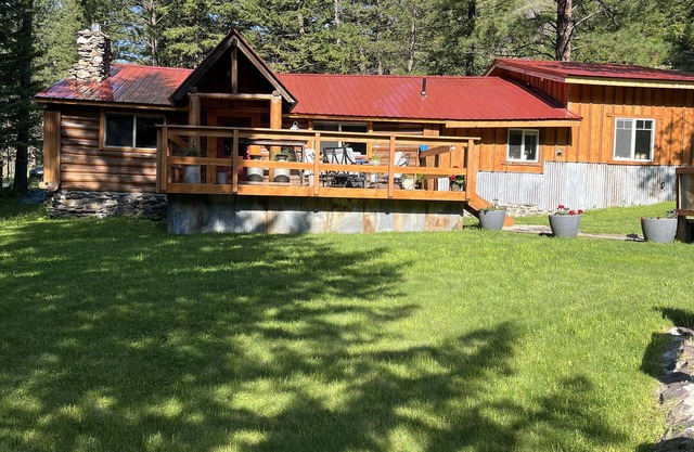 Available dates in August! Beautiful cabin with a creek running through it.