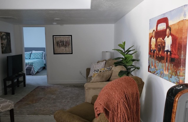 Basement in Salt Lake City dining and living room accommodation for 3 people