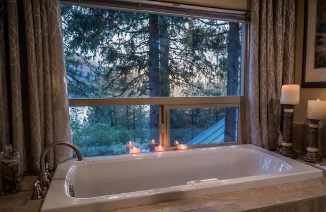 Bass Lake cabin with Lake Views & private boat dock & slip