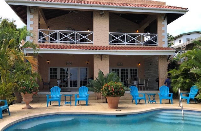 Beachfront 1 Bedroom Apartment on Courland Bay with Salt Water Pool.