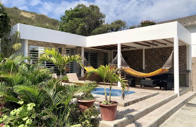 Beachfront 4 Bedrooms 4 bath House Private Direct access to the Beach.