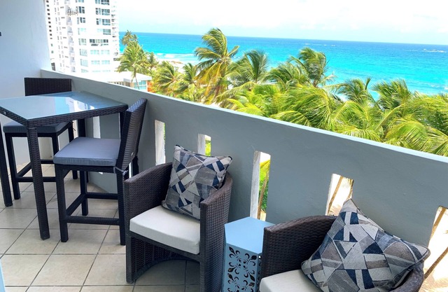 Beachfront Oceanview 2-suite condo with balcony, AC, WiFi, Pool, Fitness Room