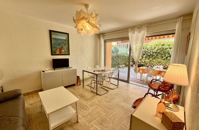 Beachside 2-Room Apartment with Private Garden, Terrace, and Parking