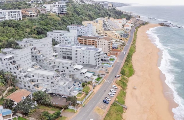 Beachside Bliss | Balcony | Pool | Sea Views