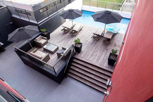 Beaufort Cozy Luxury Hideout with Restaurant, FREE Swimming pools & Gym, 10 mins from Airport, 24-7 Security Guards, Backup Power, Close to Tourist Attractions