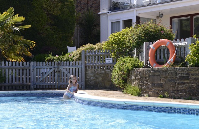 Beautiful family house with pool and views over golf course and South Downs