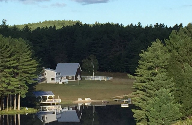 Beautiful Farmhouse located on 1200 acres of private bliss with a quiet pond.