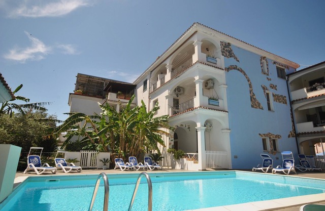 Big terrace with BBQ and sight on Pool and exotic garden