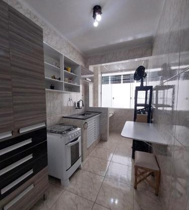 Bitenca pé na areia