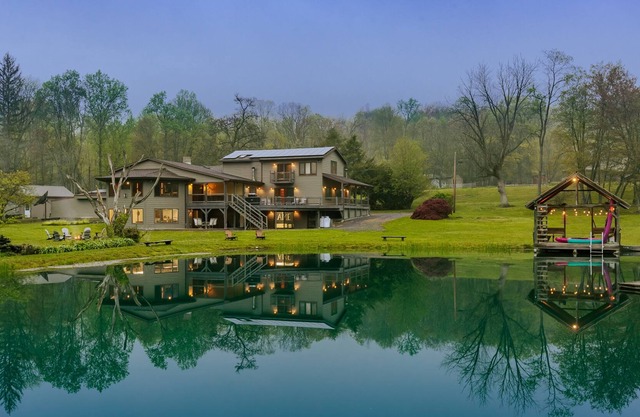 BLUE WATER LODGE ~ Sleeps 30 ~ Stunning Pond w/ Fish
