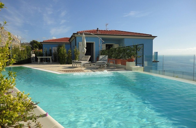 Bright and elegant villa with private pool and garden terrace with sea view