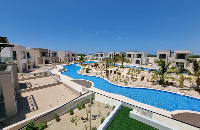Bright Studio with Pool View Balcony