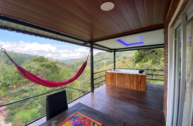 Cabin in Norcasia Jacuzzi, spring water pool and extreme attractions option.