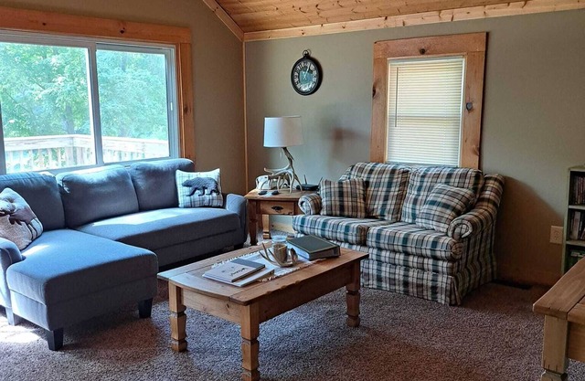 Cabin nestled in the woods for a quiet relaxing getaway with large outdoor deck!