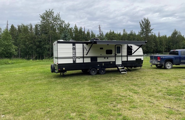 Camper trailer in quiet neighborhood near many Multi-use trails.
