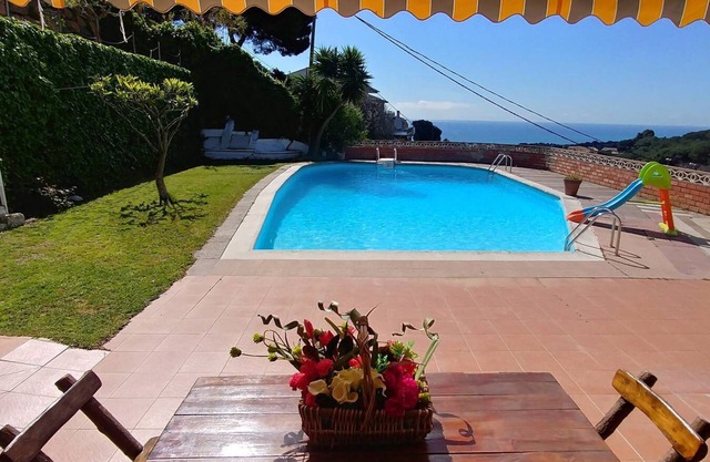 Can Carrion a large pool overlooking the sea