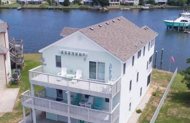 Canal Front Home with Private Dock, Multiple Decks & Hot Tub