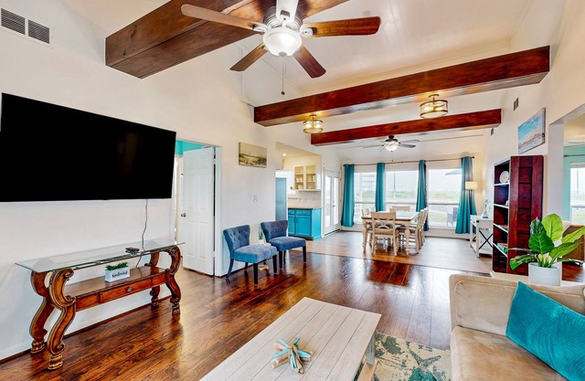 Canal view retreat with vaulted ceilings & three-story observation deck